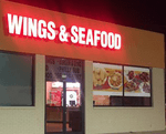 Wings And Seafood Logo